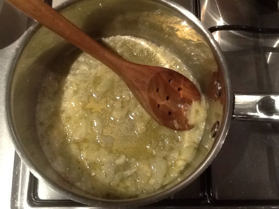 Add garlic and onion into the melted butter
