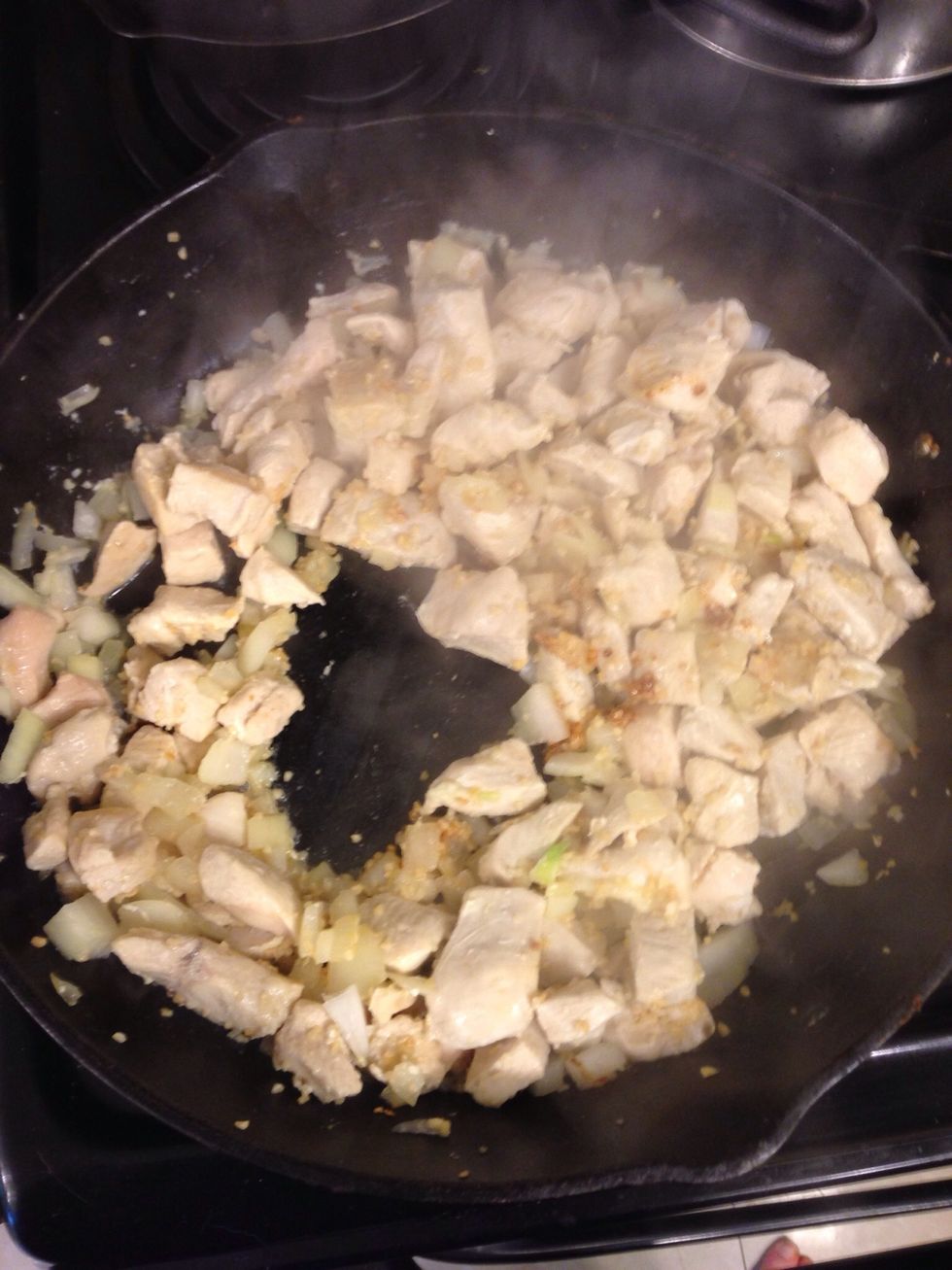 Add garlic & onions & cook for another 5 minutes or until the onion is tender-crisp, stirring occasionally.