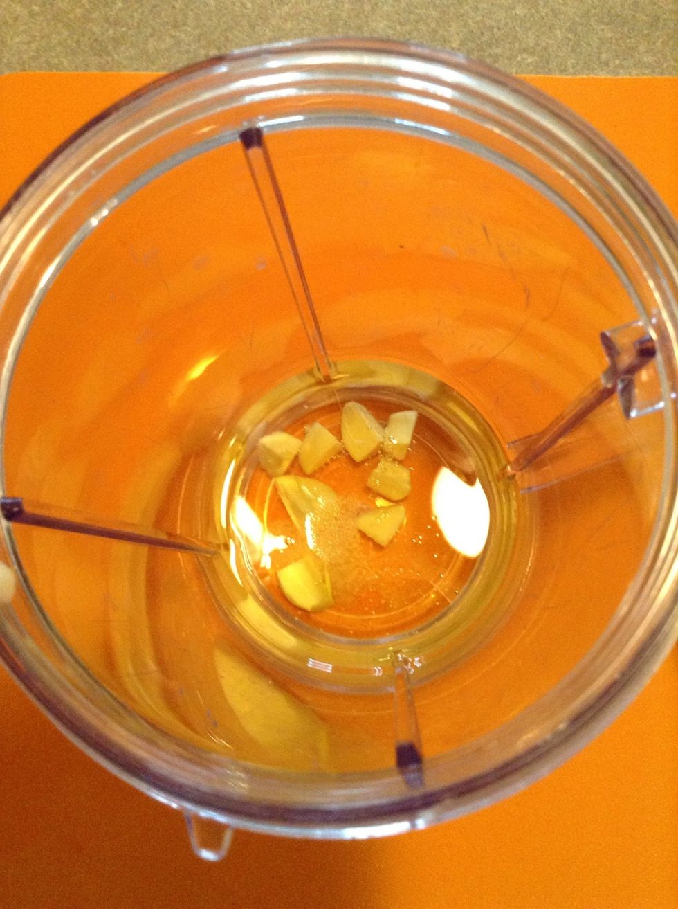 Add Garlic, salt, and lemon juice to the olive oil