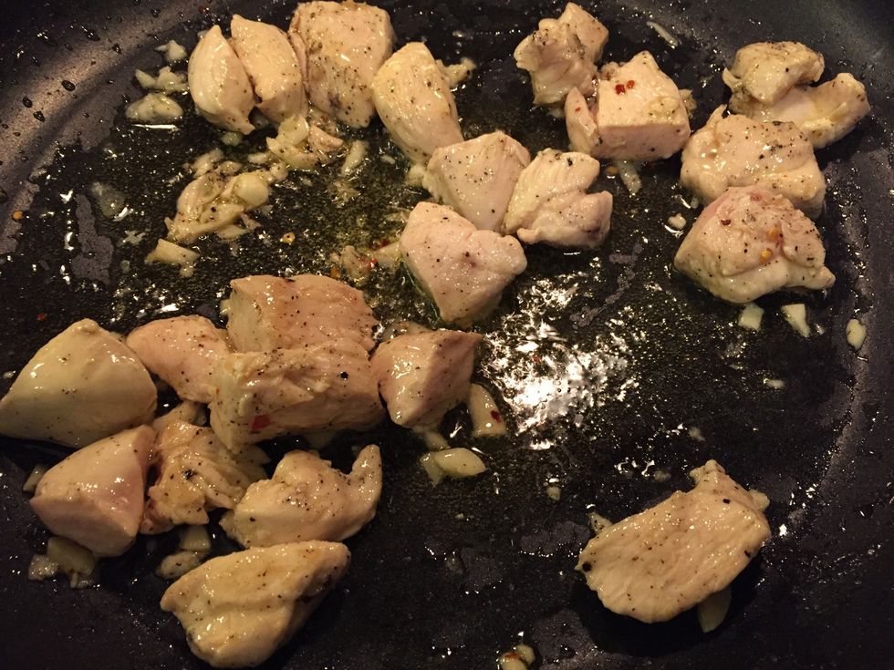 Add garlic, salt, pepper, & optional chilli flakes to pan.