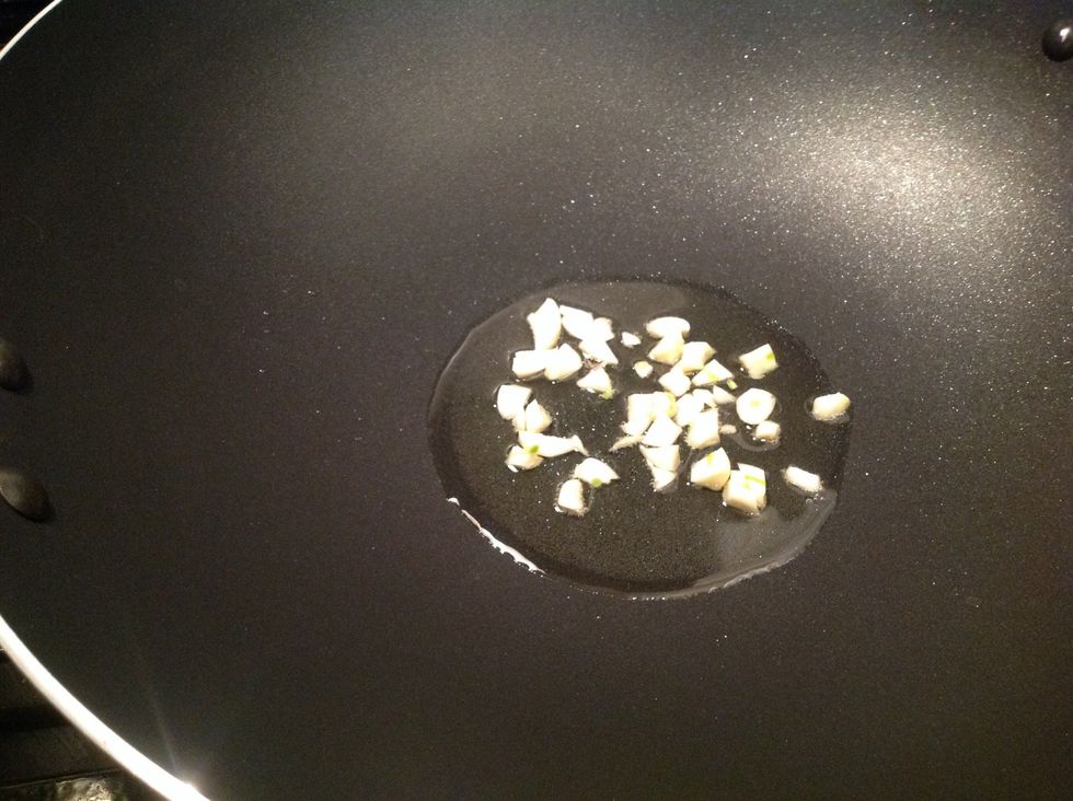 Add garlic to oil, cook on high heat for 1 minute