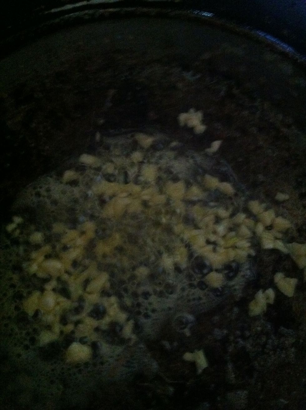 Add garlic with butter