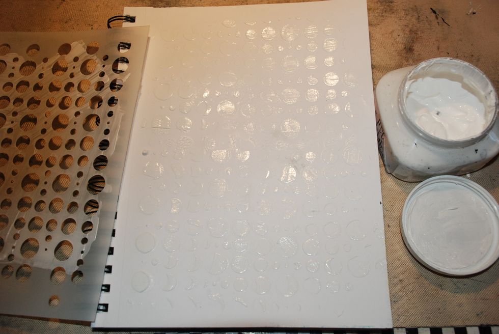 Add gesso with the Bubble stencil.
