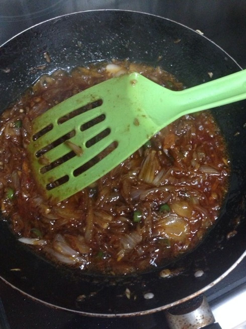 Add ginger garlic and chili, 1tblspoon soya sauce and Thai chili sauce and ketchup and a little chili powder.