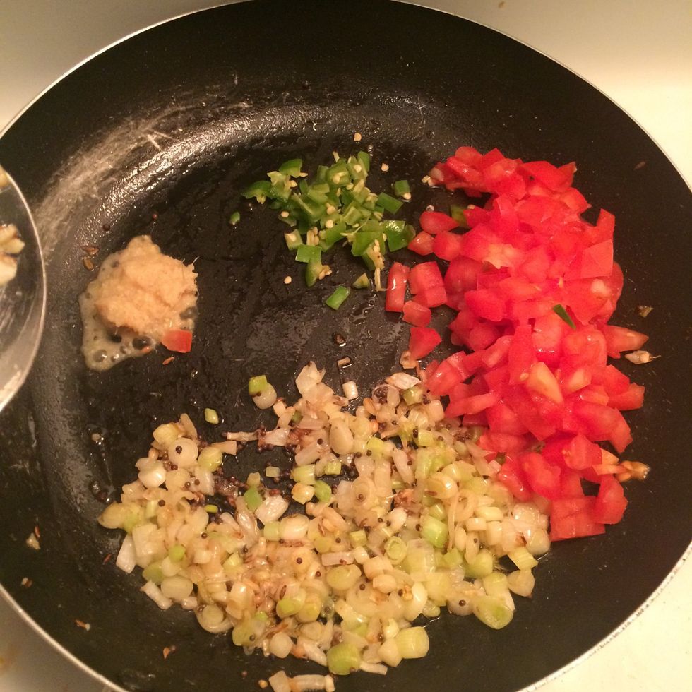 Add ginger/garlic paste, green chillies, tomato and saut\u00e9 it
