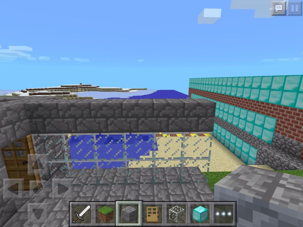 Add glass blocks on each side. Make sure you put two glass blocks as shown here.