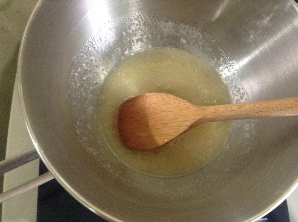 Add glucose/corn syrup, mix well.