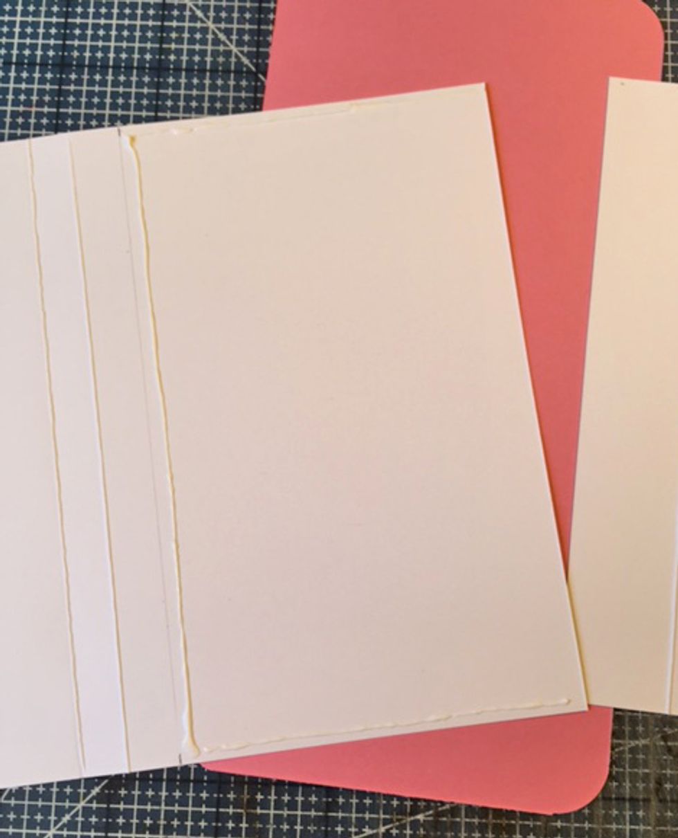 Add glue in a U-shape along top and bottom and along marked line.