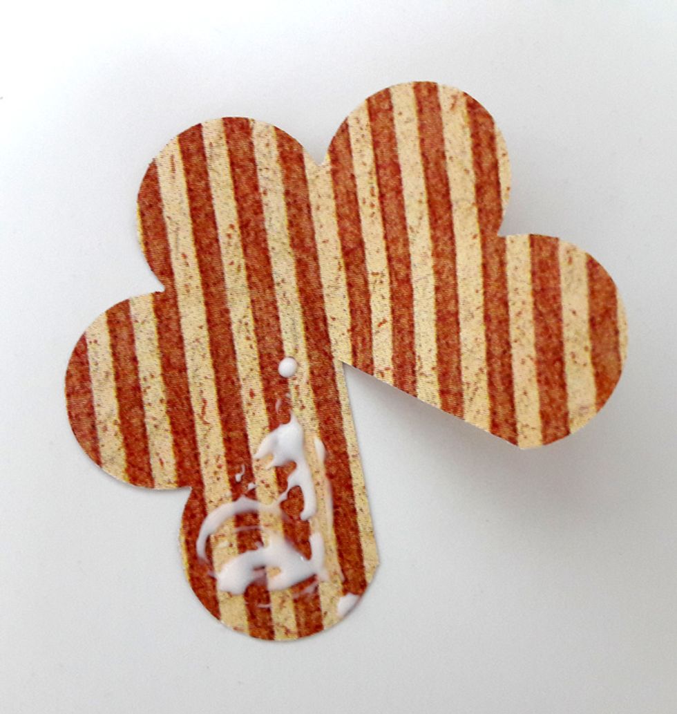 Add glue on left petal.