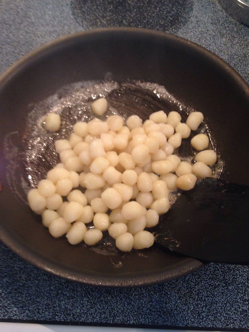 Add gnocchi and stir constantly.
