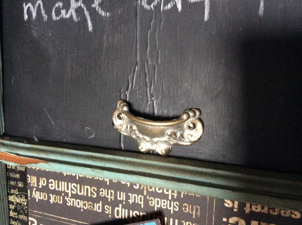 Add Graphic 45 drawer pull to chalkboard pane. (Hot glue into place).
