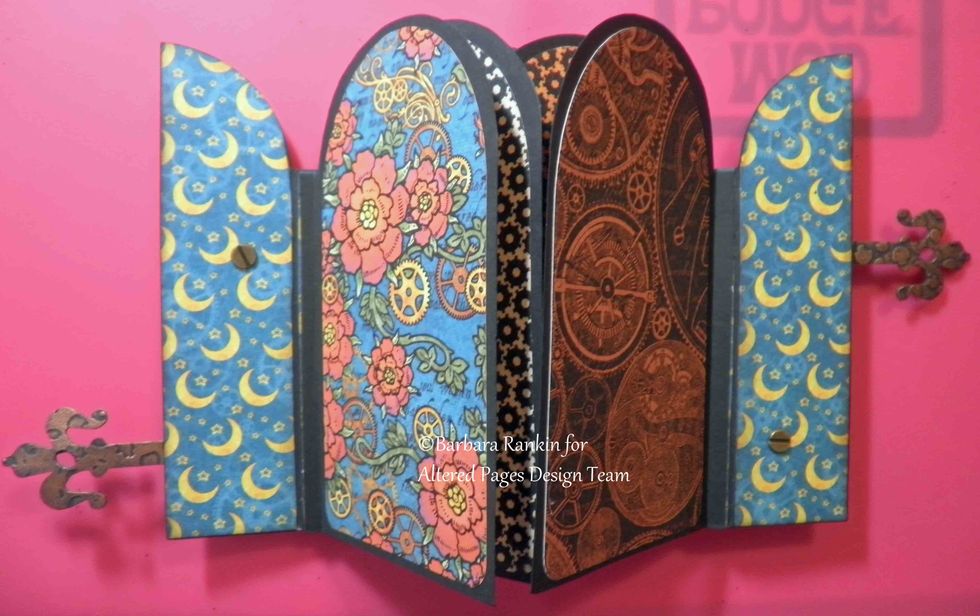 Add Graphic 45 Steampunk Spells papers over black CS pages, leaving a small border of black around each page. Again, adding your Xyron adhesive to each paper will make this an easy process.