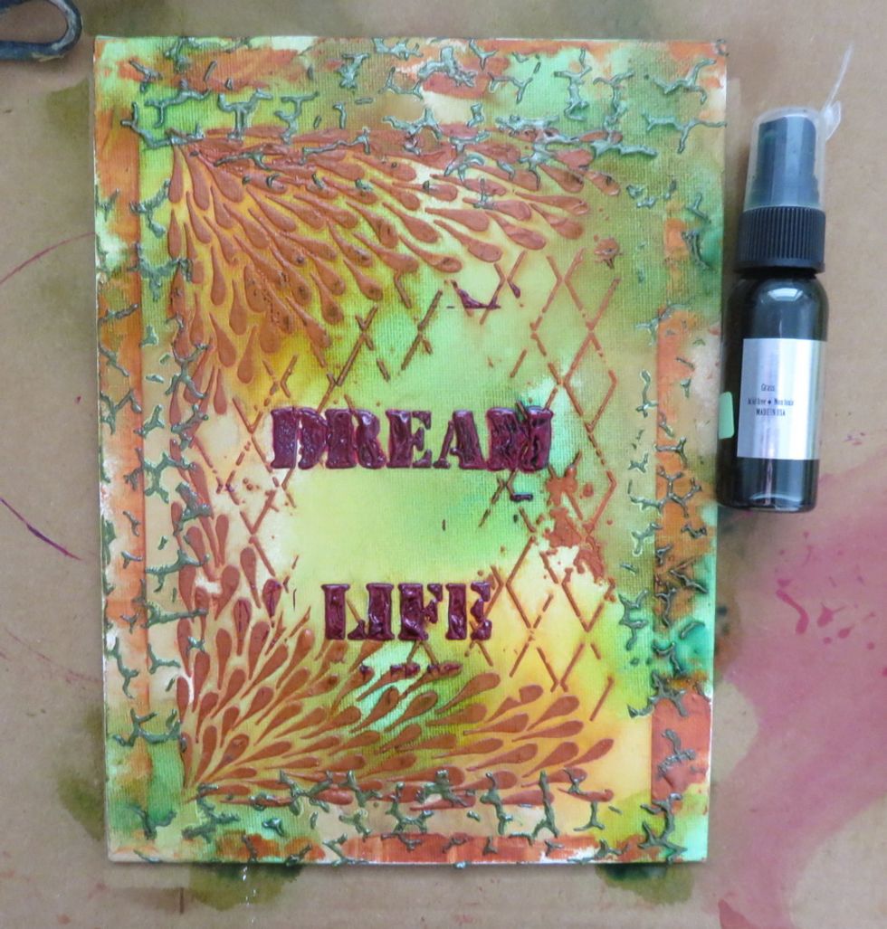 Add Grass Colorations spray as the last one over the canvas.