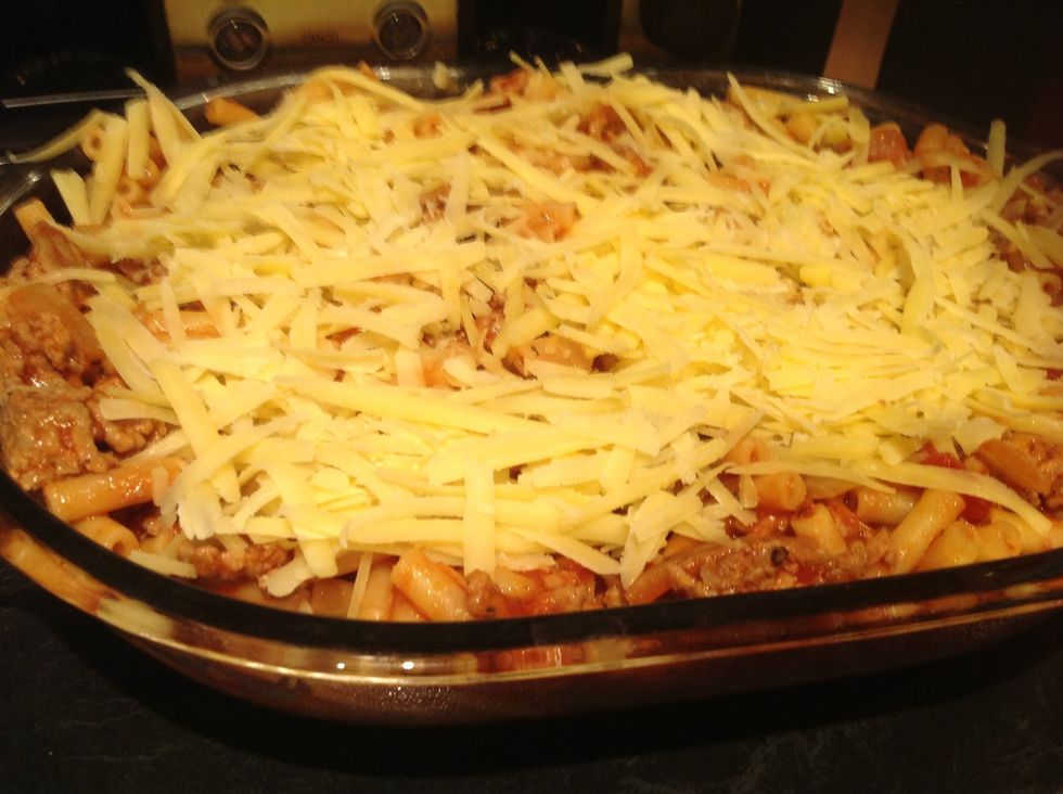 Add grated cheese on top and bake for 20 minutes at 180 degrees Celsius or 350 degrees Fahrenheit