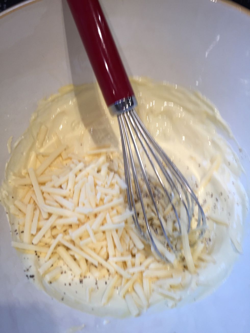 Add grated cheese, salt and pepper