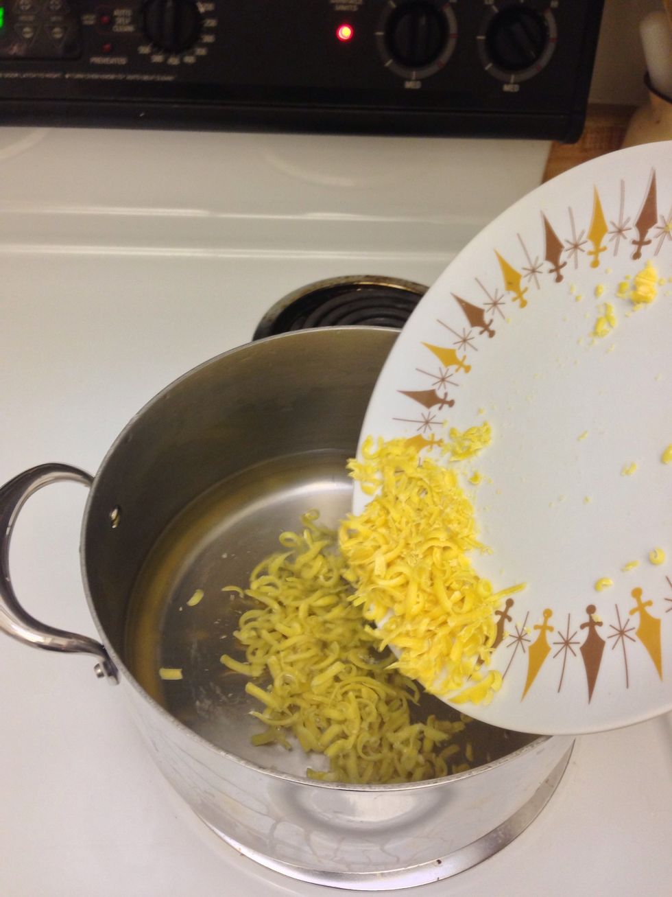 Add grated soap to water