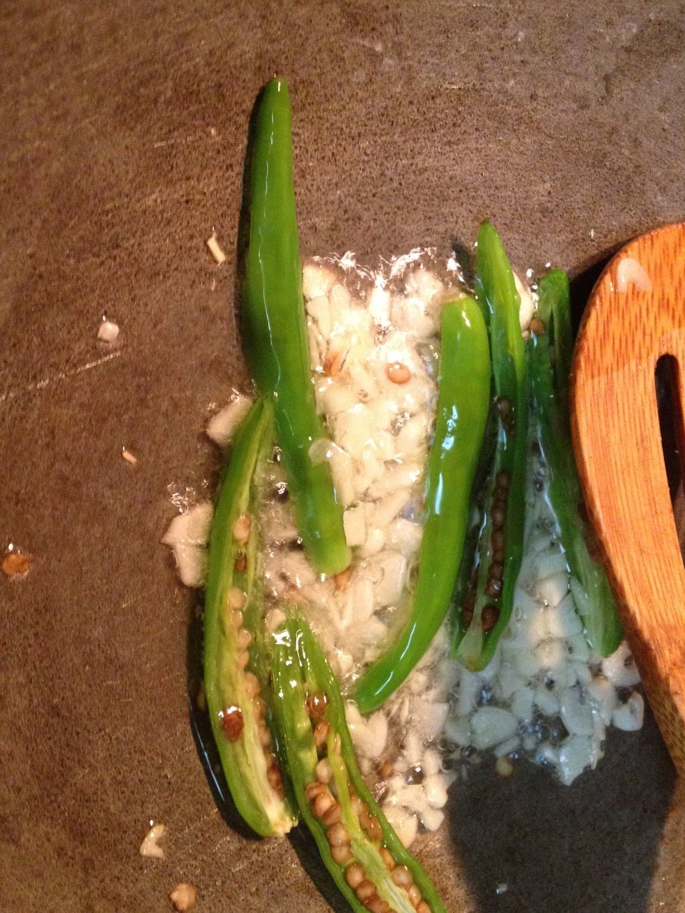 Add green chillies and saut\u00e9 for another minute