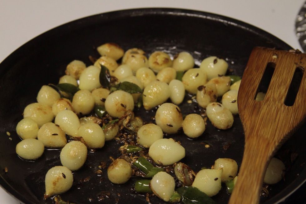 Add green chillies to the pan and stir for 5 sec