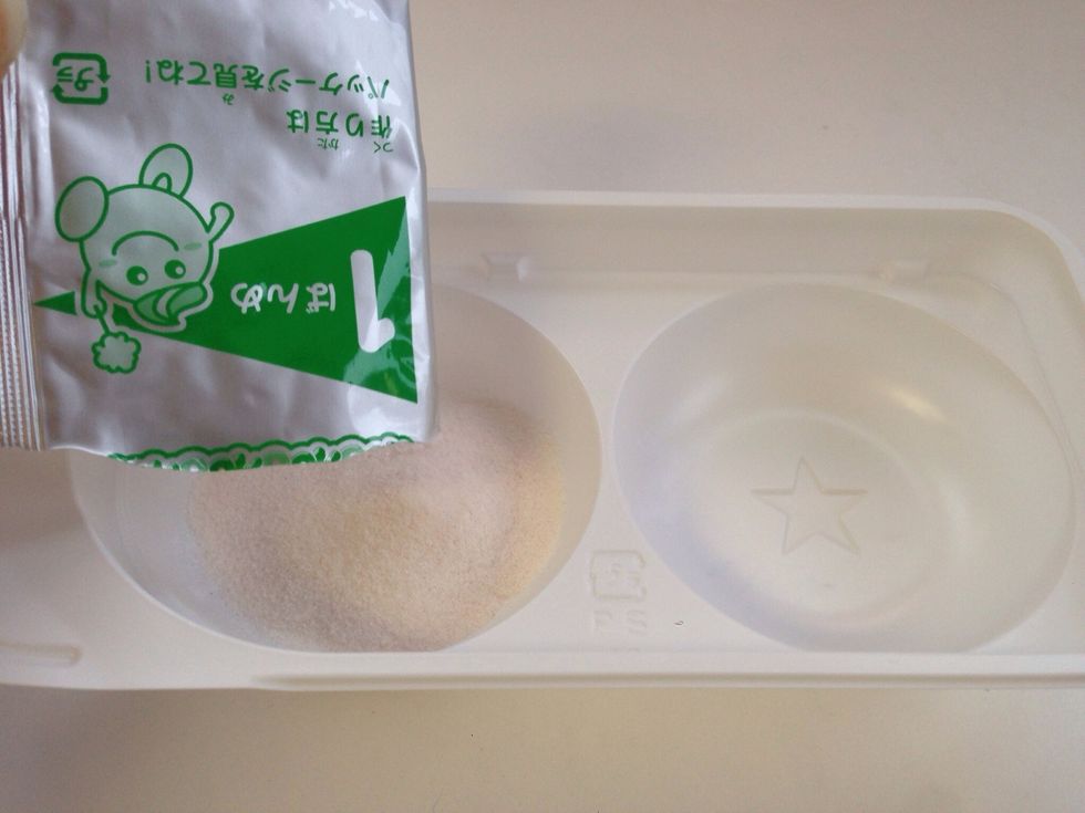 Add Green Packet #1 to Left side of Container