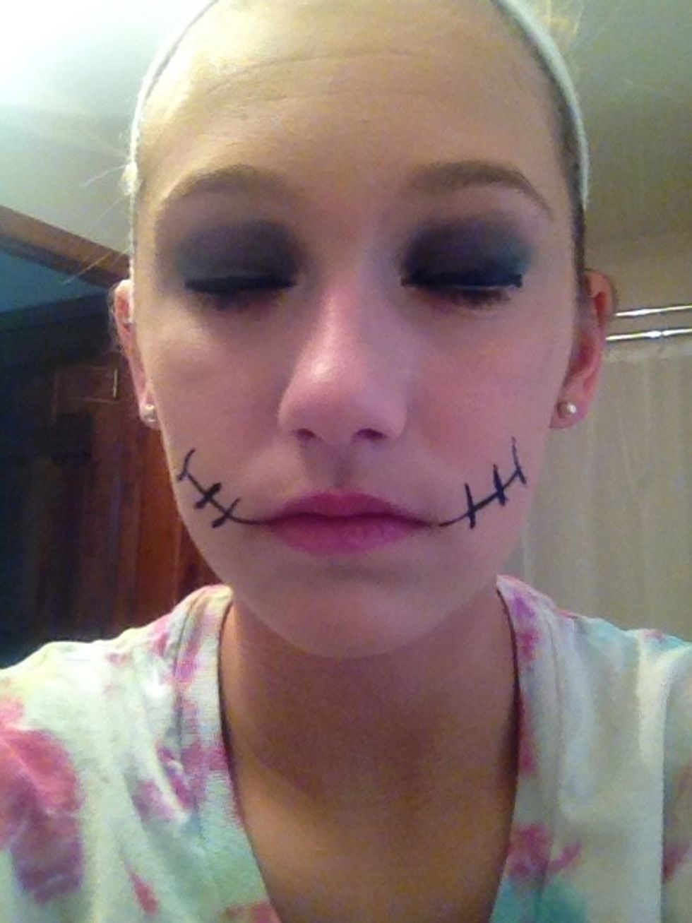 Add grey eyeshadow, and a fairly good bit of it.