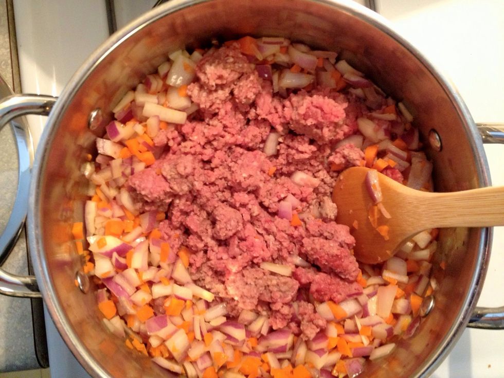 Add ground beef/turkey and allow to brown. Reduce heat medium.