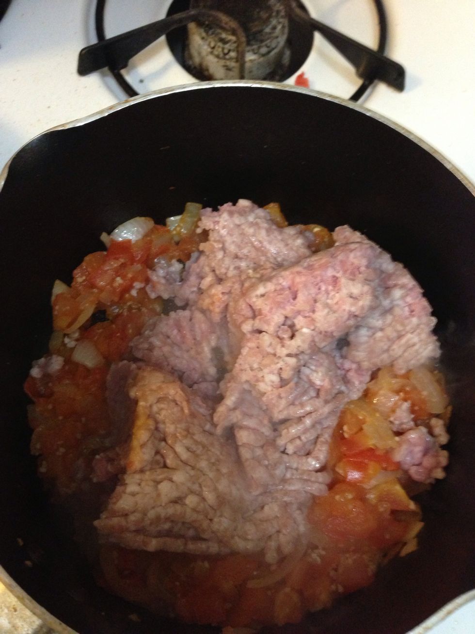 Add ground pork and cook it through