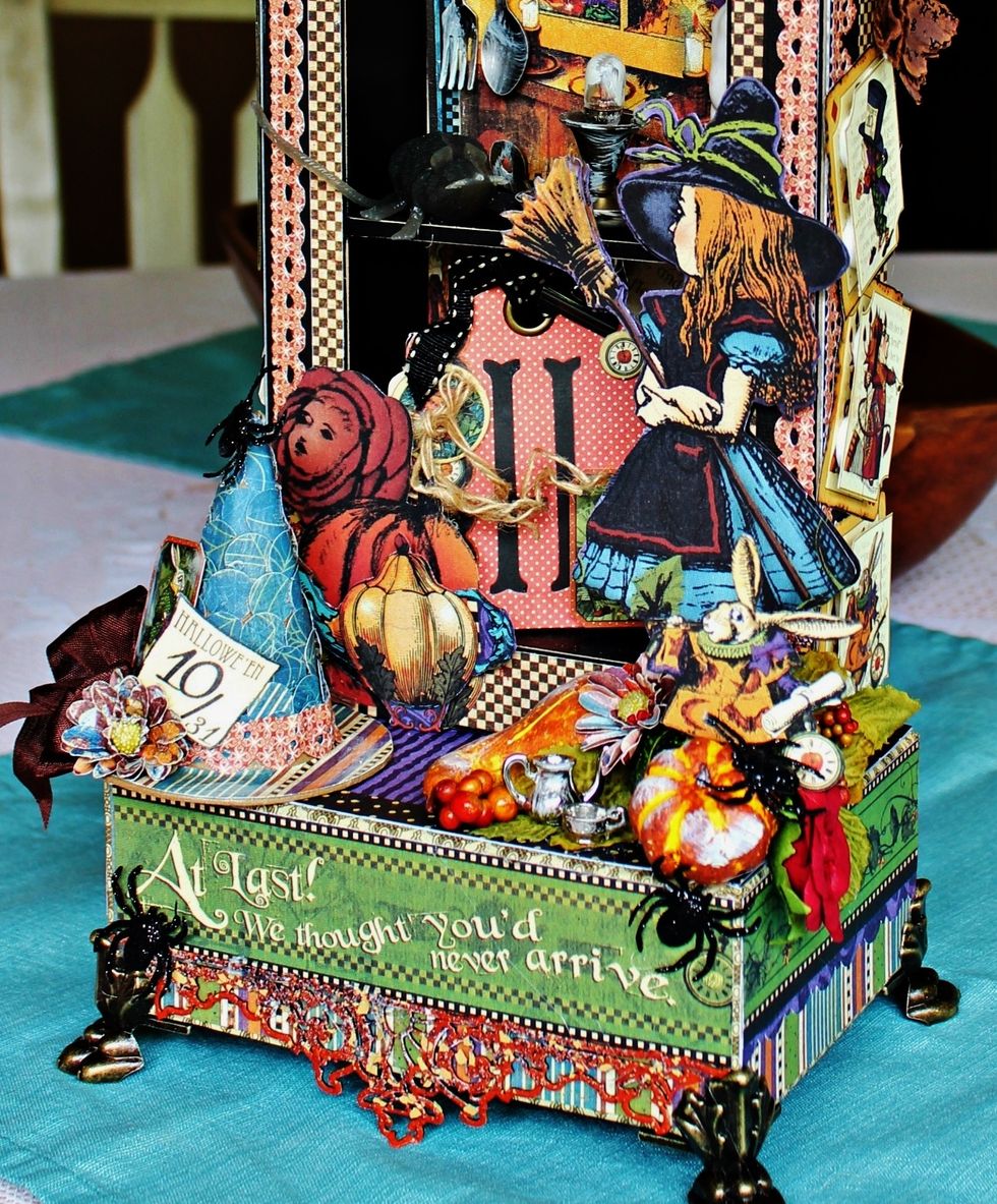 Add "H" tag that is decorated to inside of bottom space. Adhere spiders on box.