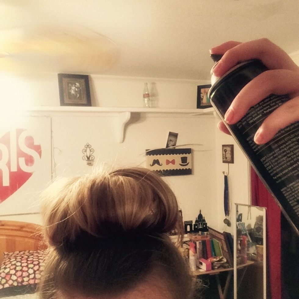 Add hairspray and bobby pins if needed