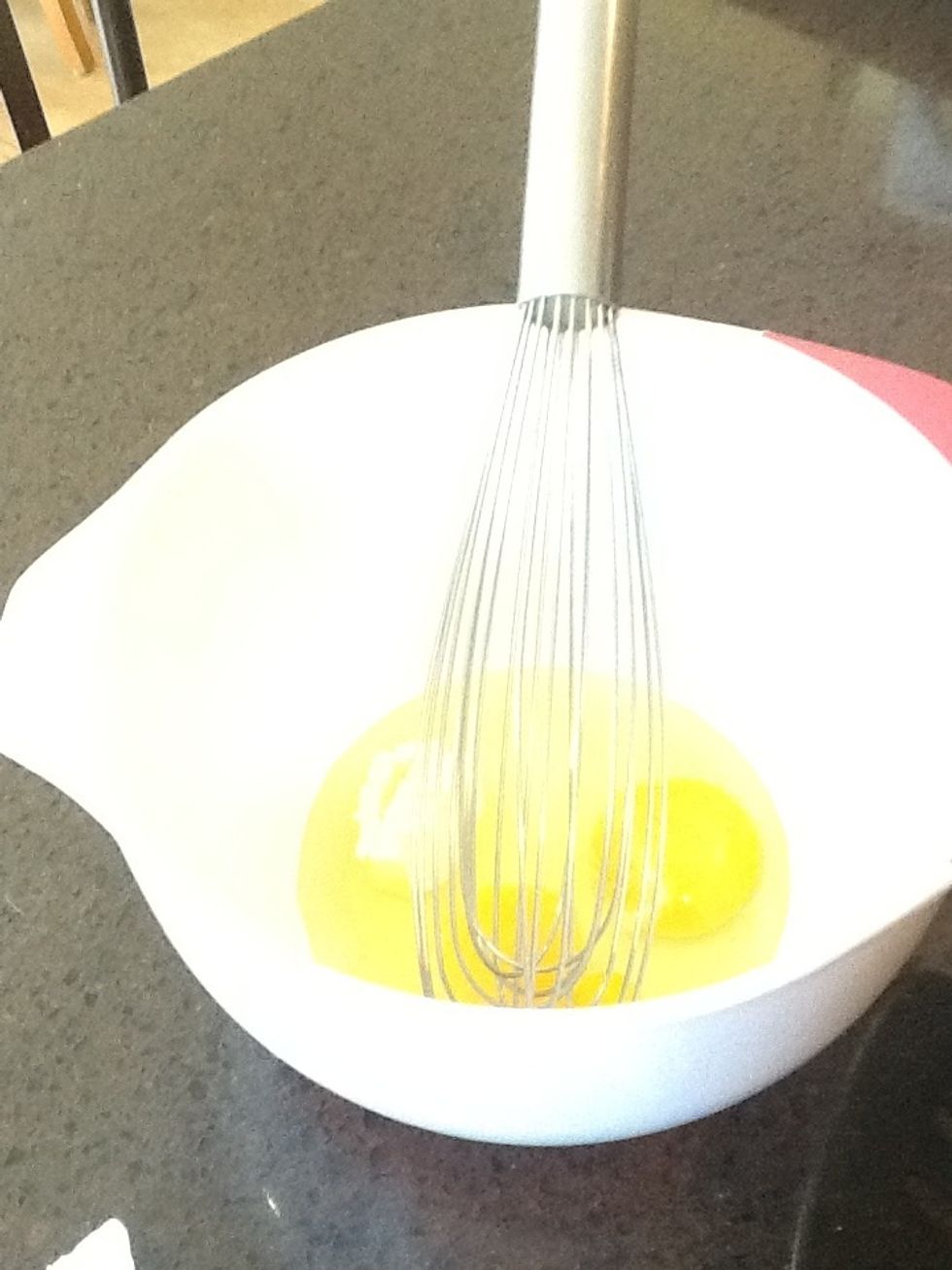 Add half a tablespoon of butter to eggs and stir