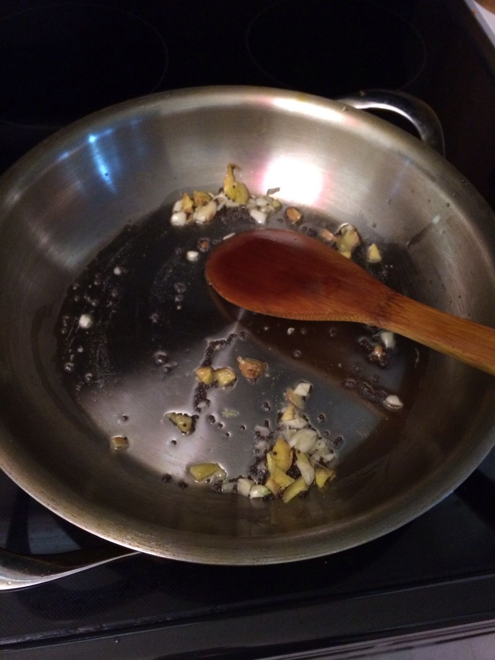 Add half a teaspoon of mustard seed and they will pop. Then add the chopped garlic and ginger..stir the pan for one minute... Then add the sliced onion.