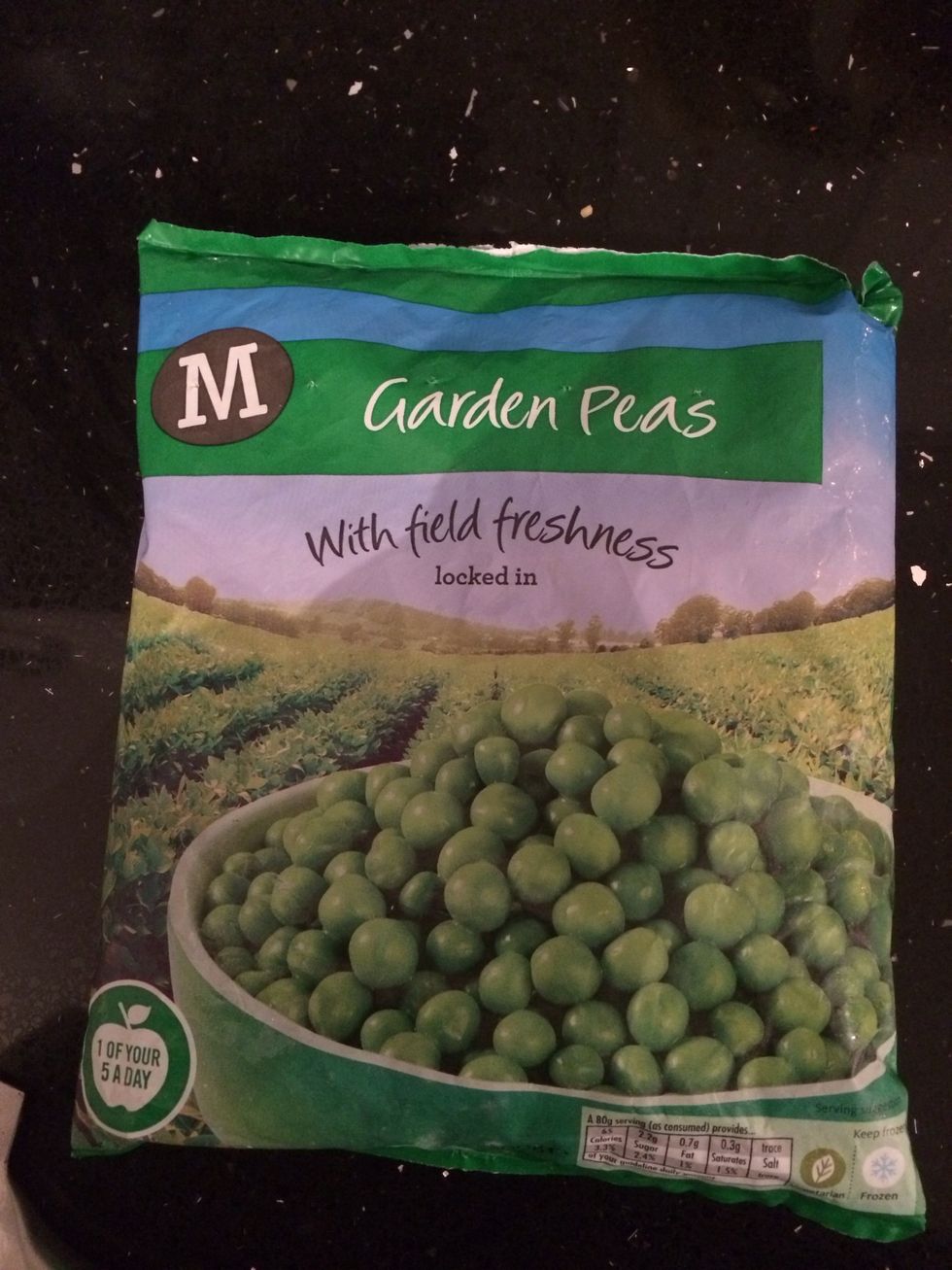 Add half bag frozen peas and turn heat to medium and cook for 2-3 mins