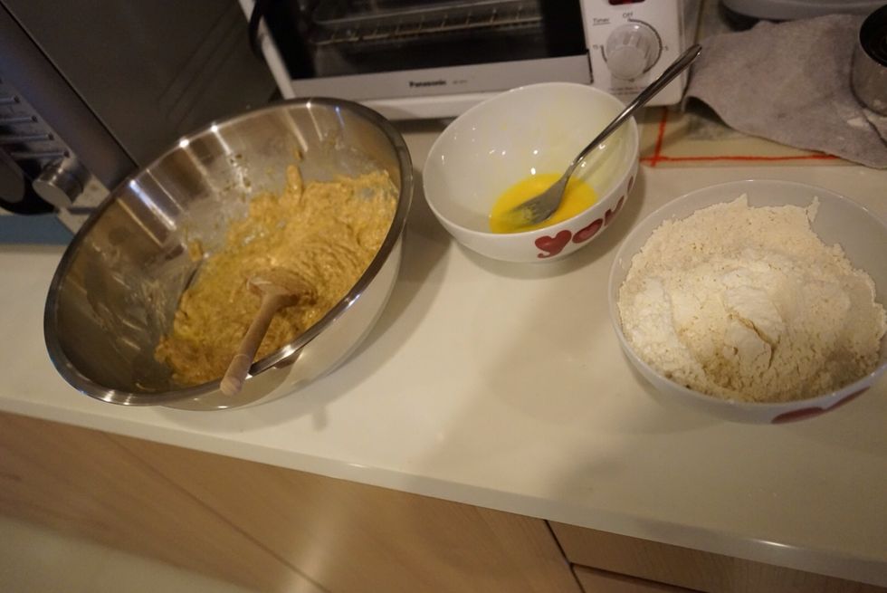 Add half by half of the eggs to the butter and beat well each time or it will separate. Preheat the oven to 180c