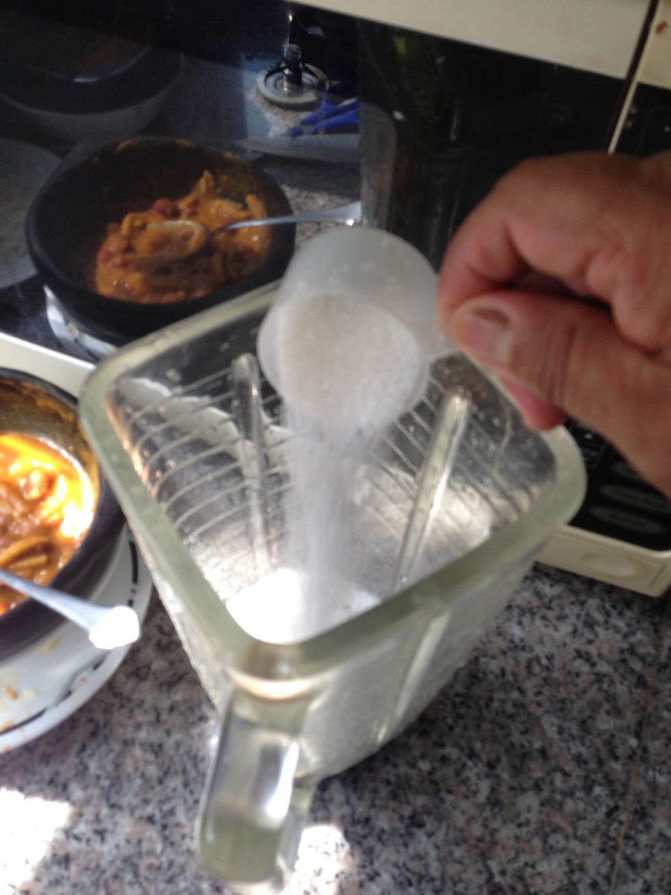 Add half cup of sugar to the blender
