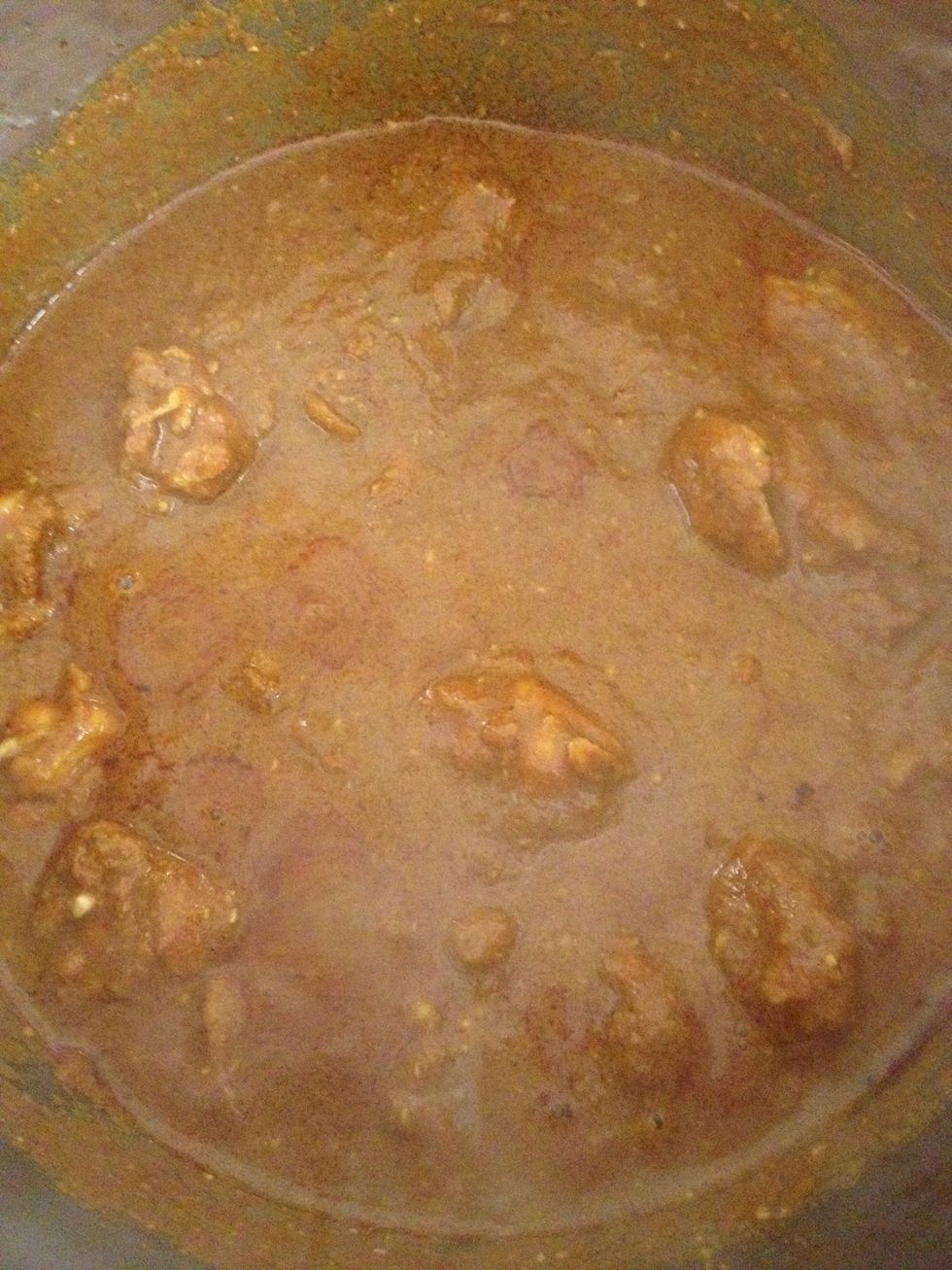 Add half cup of water and mix well. This is to ensure the paste do not get burnt. Simmer for 5 minutes in medium heat