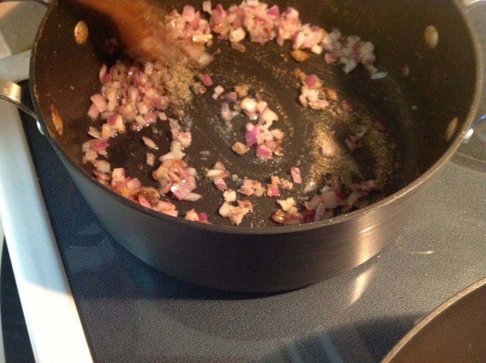 Add half of a teaspoon of salt and a half a tablespoon of cumin and pepper