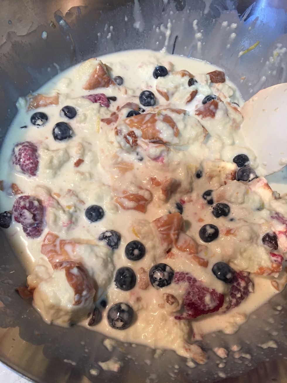 Add half of berries and chocolate chip and fold in the mixture.