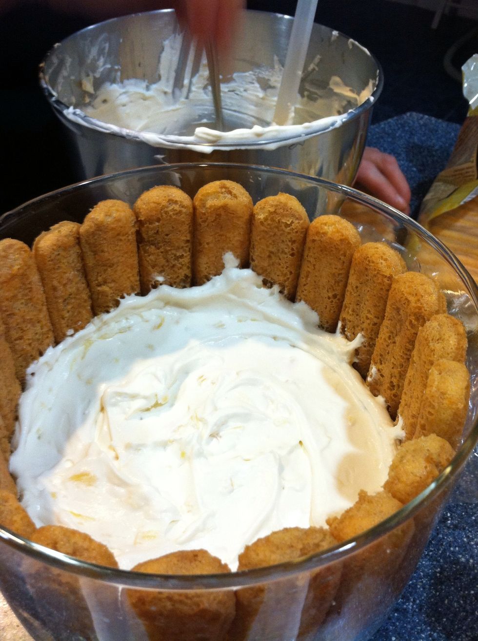 Add half of the cream cheese mixture into the bowl. Spread evenly!