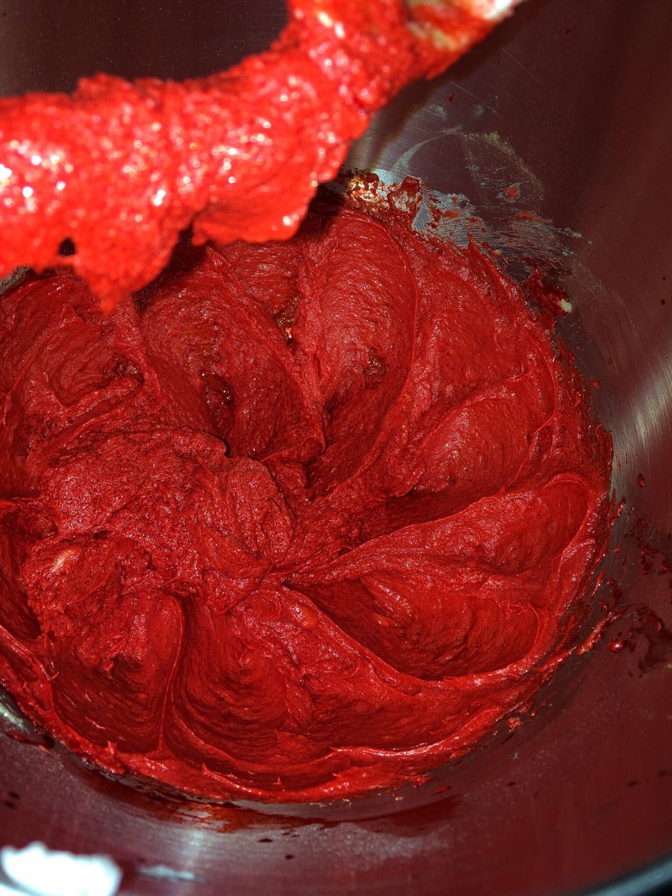 Add half of the flour mixture scrape down sides of bowl