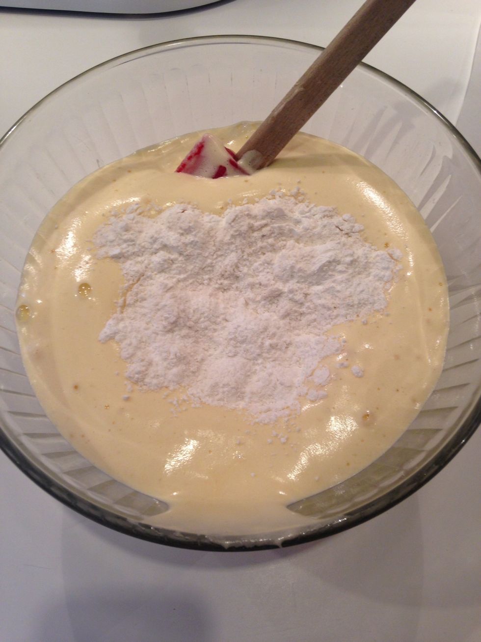 Add half of the flour mixture to the sponge.