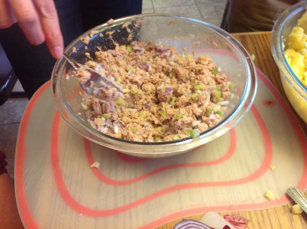 Add half of the onion to celery and tuna and salt to taste