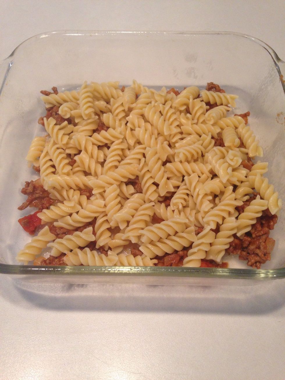 Add half the pasta.