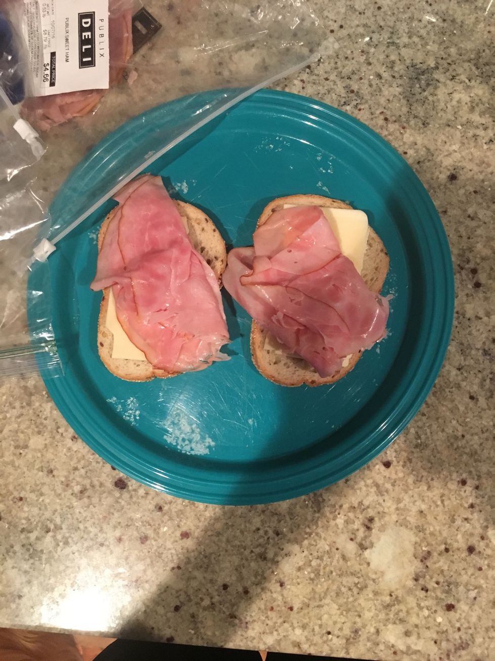 Add ham and cheese to your bread