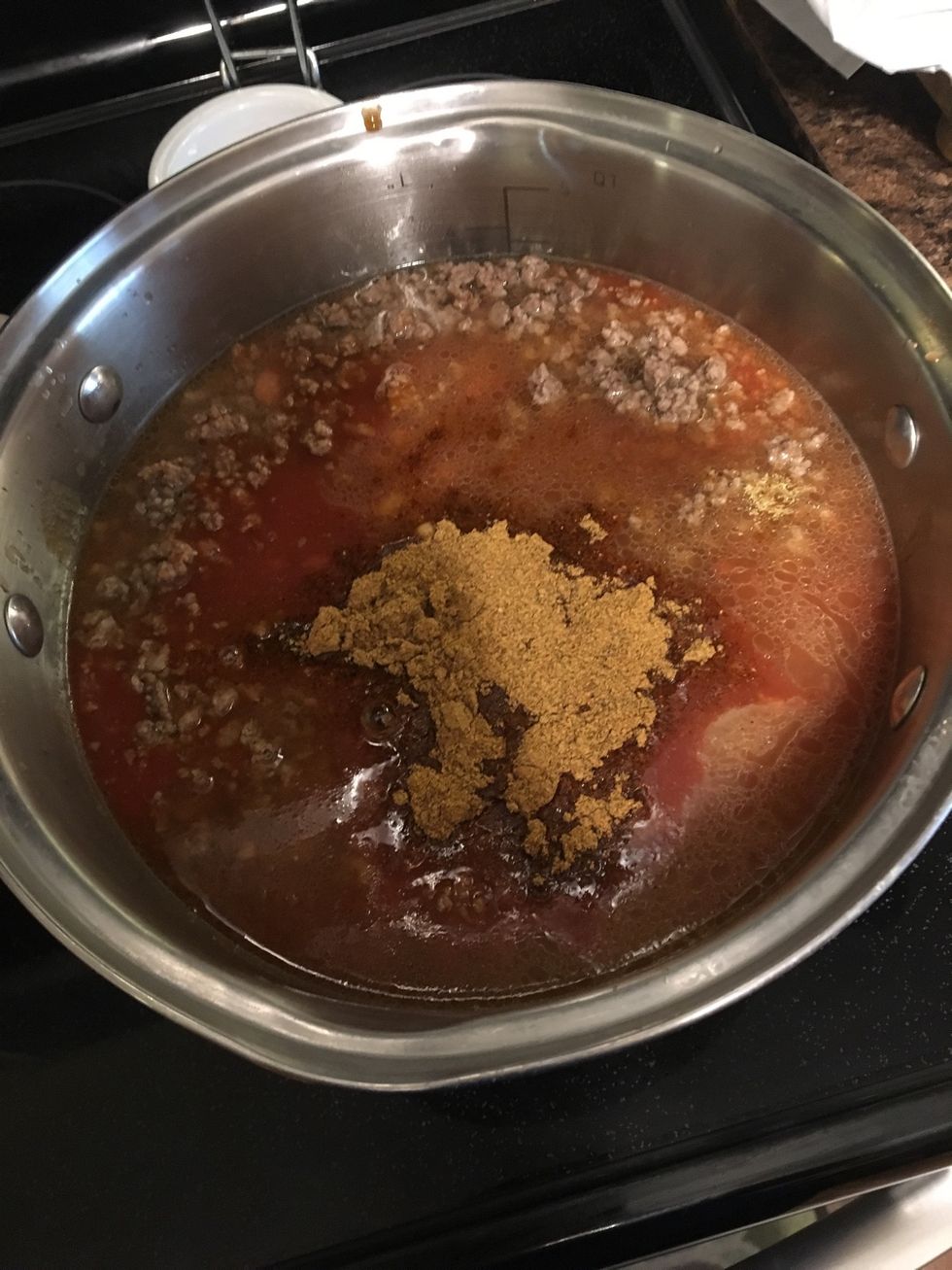 Add hamburger to mixture, stir, and return to stove. Cover and bring to a boil, stirring occasionally.