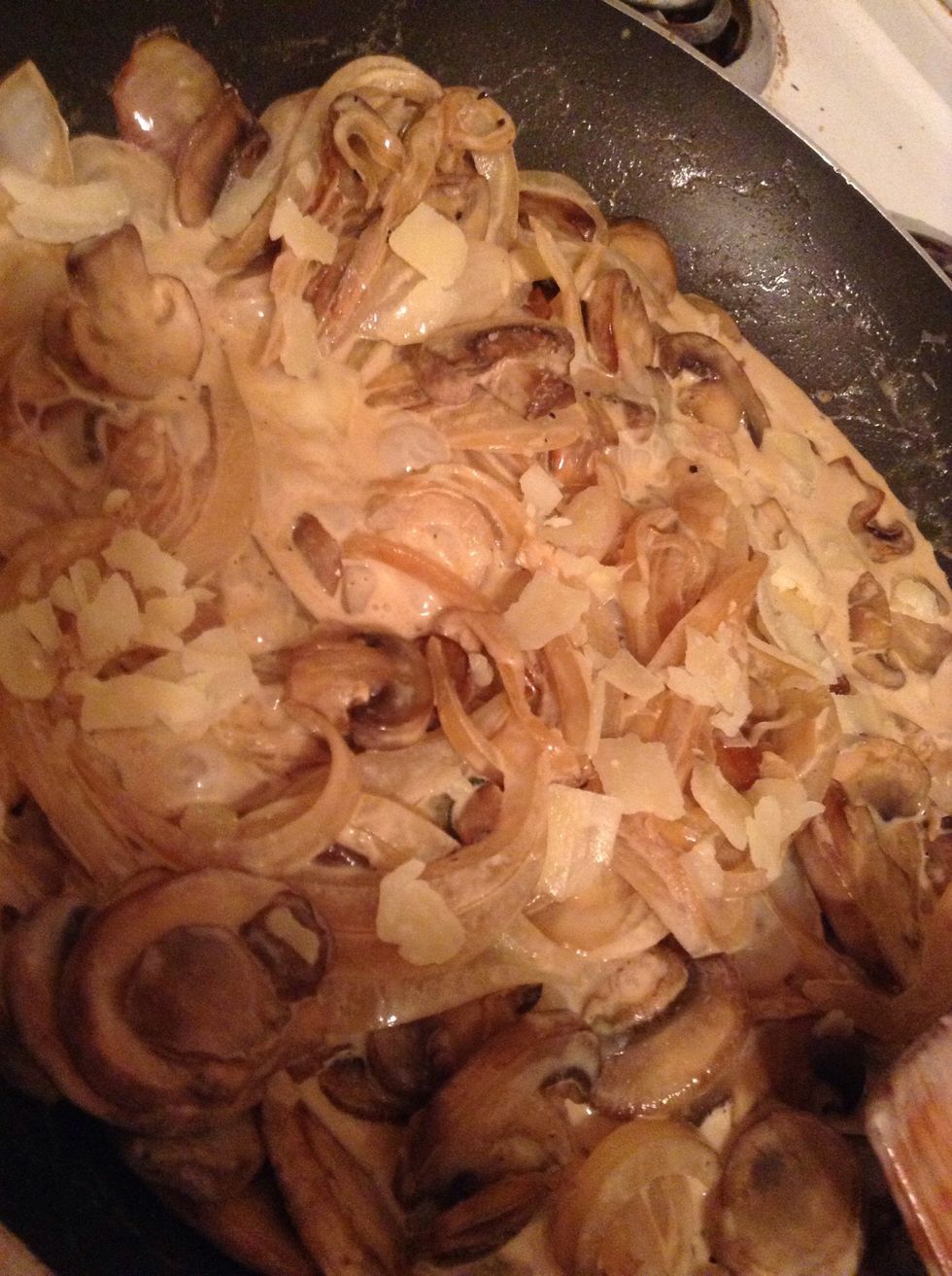 Add heavy cream and as much Parmesan as you'd like -- keep stirring and let cream reduce and thicken