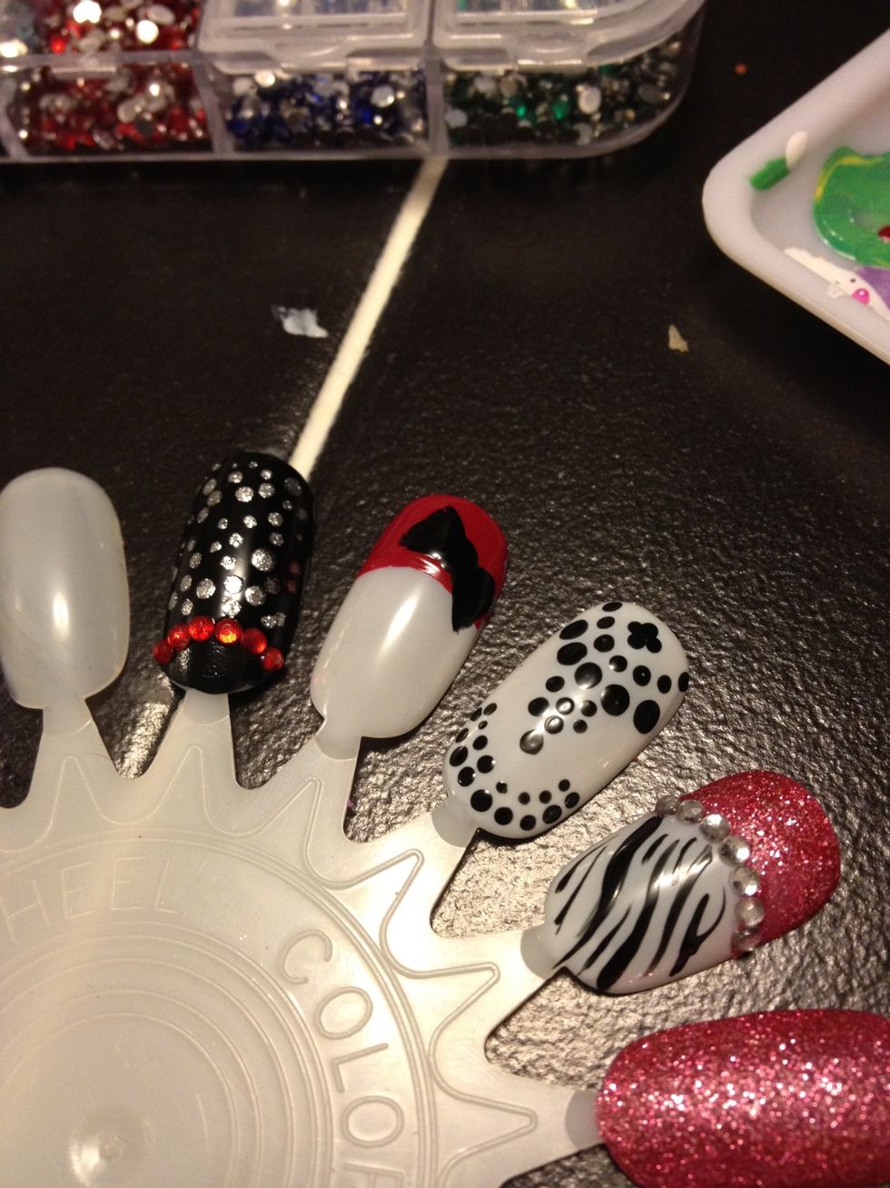 Add her bows, you can learn how to create a perfect bow by checking out my hello kitty design guide :)