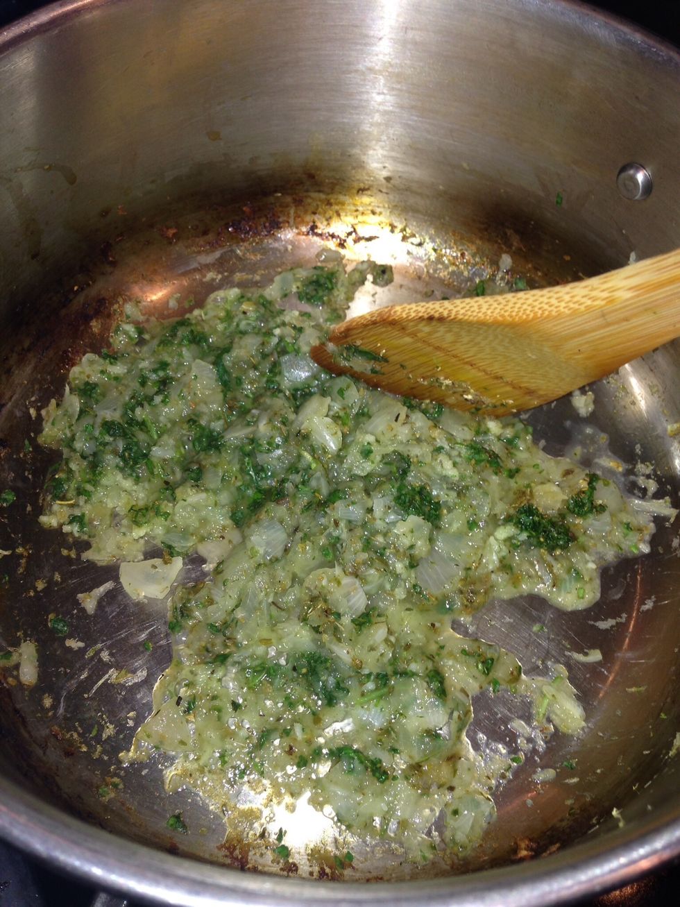 Add herbs and garlic to the onions and saut\u00e9 3 minutes more.