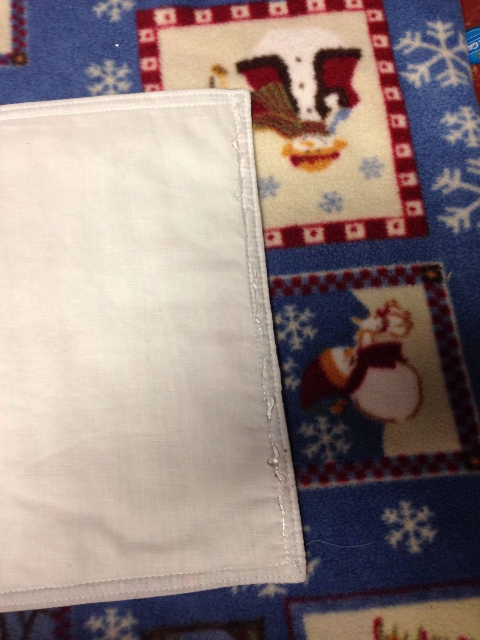 Add hot glue on 3 out of the 4 sides.