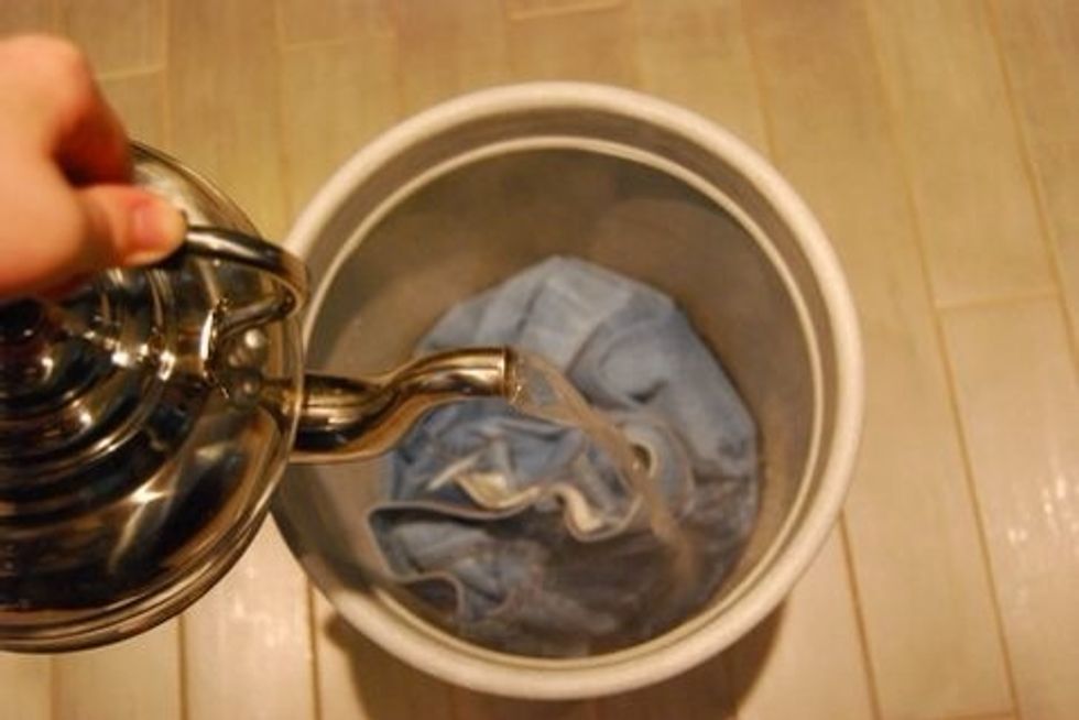 Add HOT or BOILING water to the Jeans and squish down to ensure they are all under the water. No air trapped inside the pants!