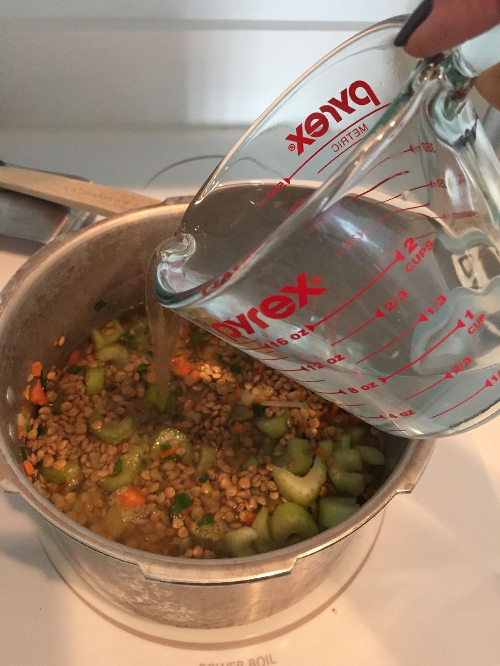 Add hot water from the faucet  - enough to cover everything plus an extra inch. Usually comes out to about 6 cups.