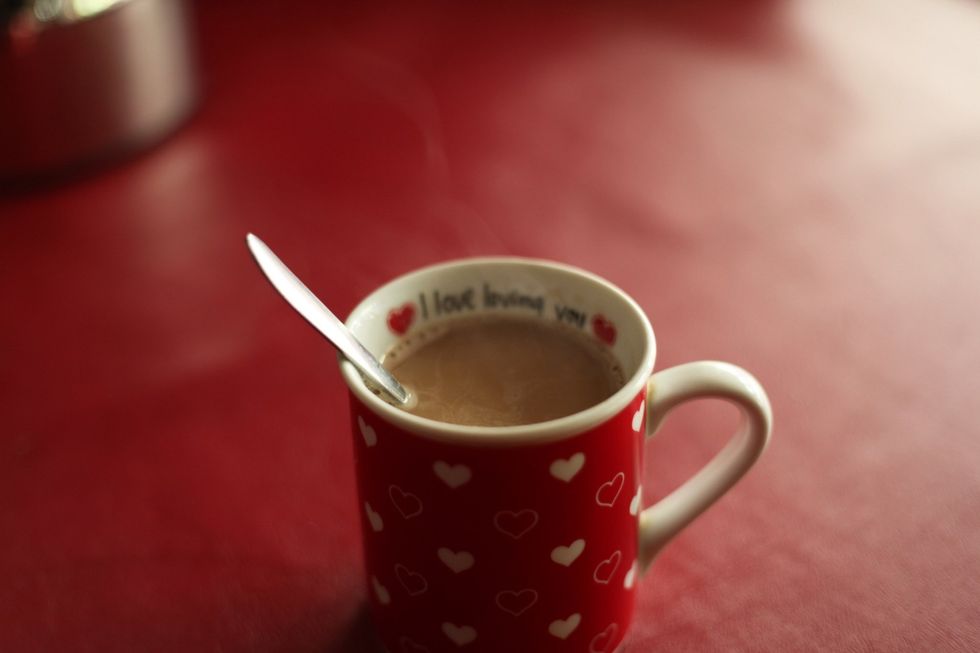 Add hot water. Stir like crazy without spilling it or causing a coffee tsunami and sit back and enjoy a creamy, somewhat frothy coffee with one of the biscuits you made from my previous guide.